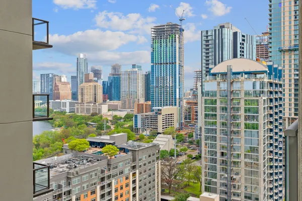 a view of a city with tall buildings