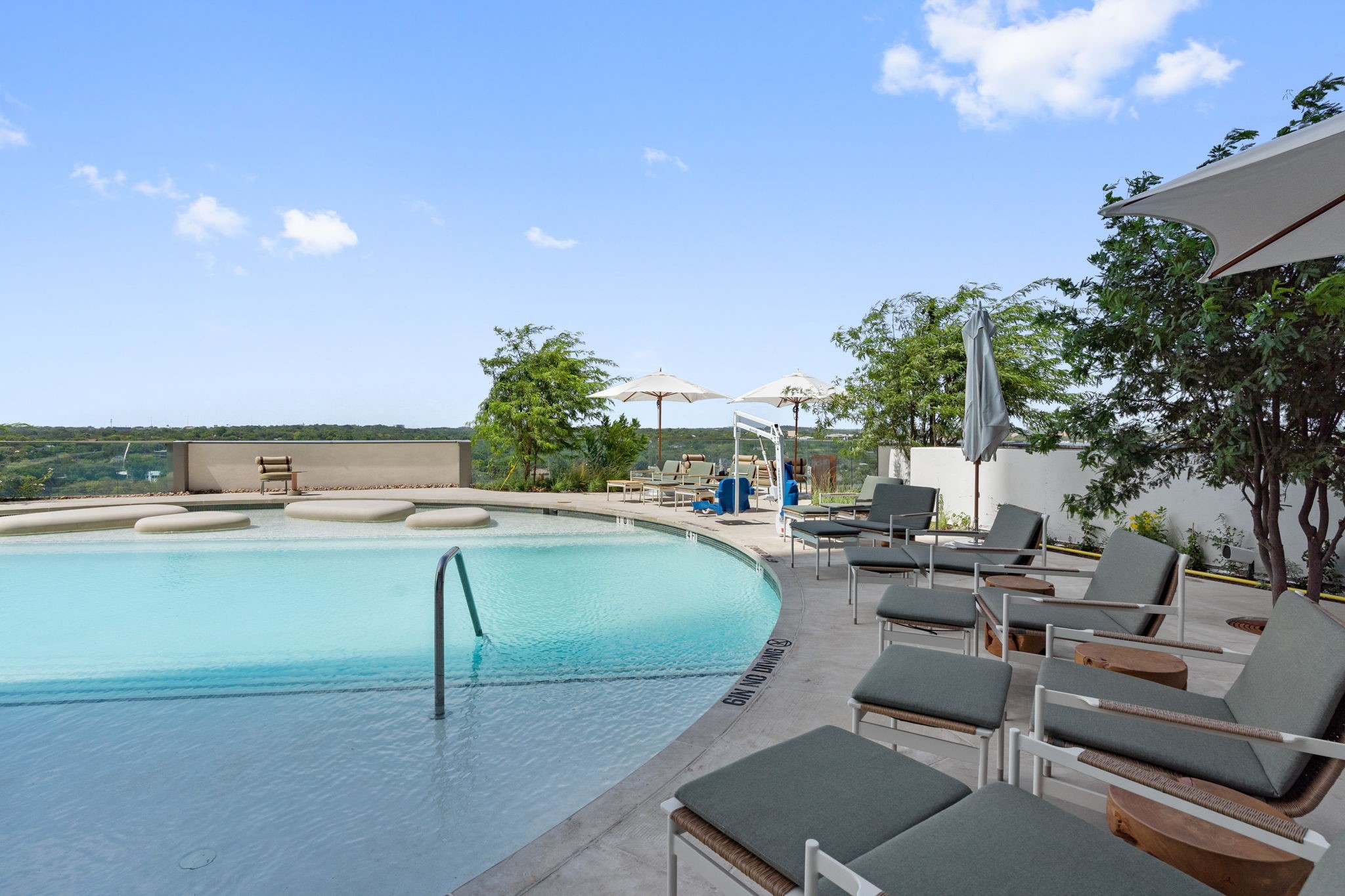 44 East Avenue, Unit 1902 Austin, TX 78701 - Photo 33 of 40 a view of a swimming pool with outdoor seating and a terrace
