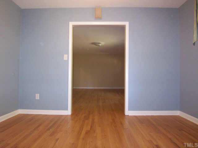 309 West Cornwallis Road Durham, NC 27707 - Photo 3 of 10 A view of the dining room and living room.