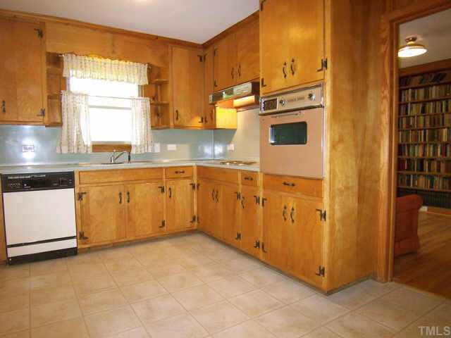 309 West Cornwallis Road Durham, NC 27707 - Photo 7 of 10 Kitchen with garbage disposal and dishwasher.
