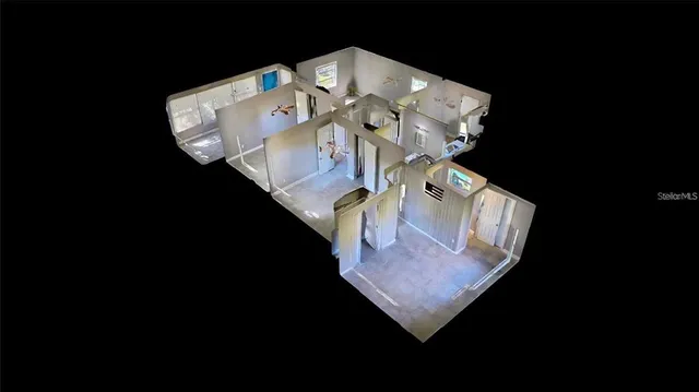 a view of living room with furniture and a clock