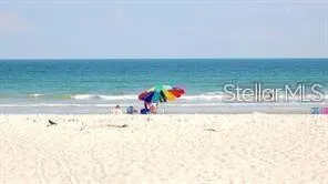 a view of swimming pool with an ocean view