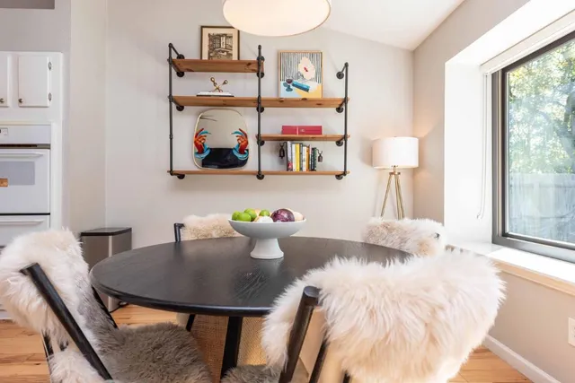 a view of a dining room with furniture