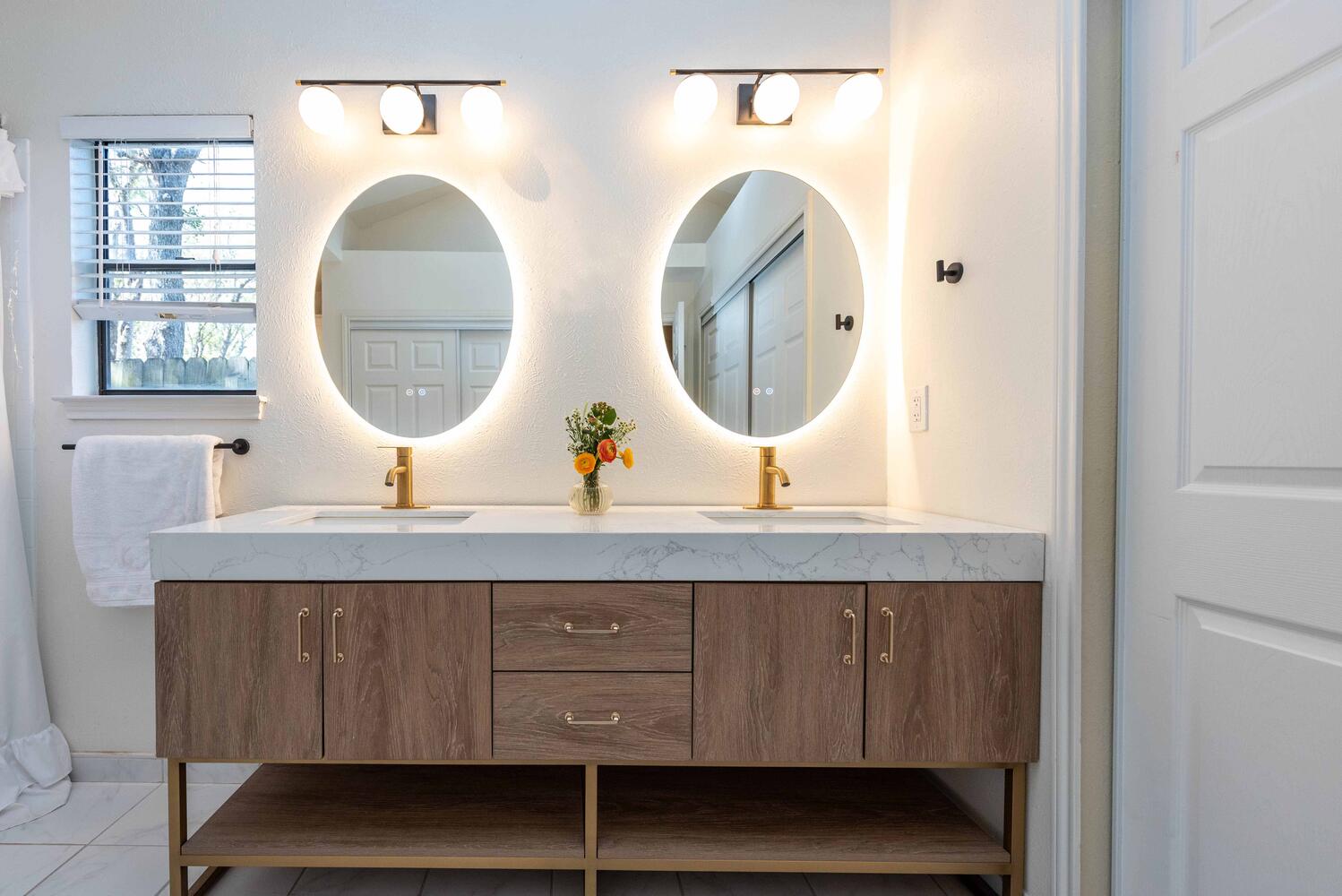 3403 Palomar Lane Austin, TX 78727 - Photo 23 of 33 Full bathroom with double vanity, a shower, and light tile patterned floors
