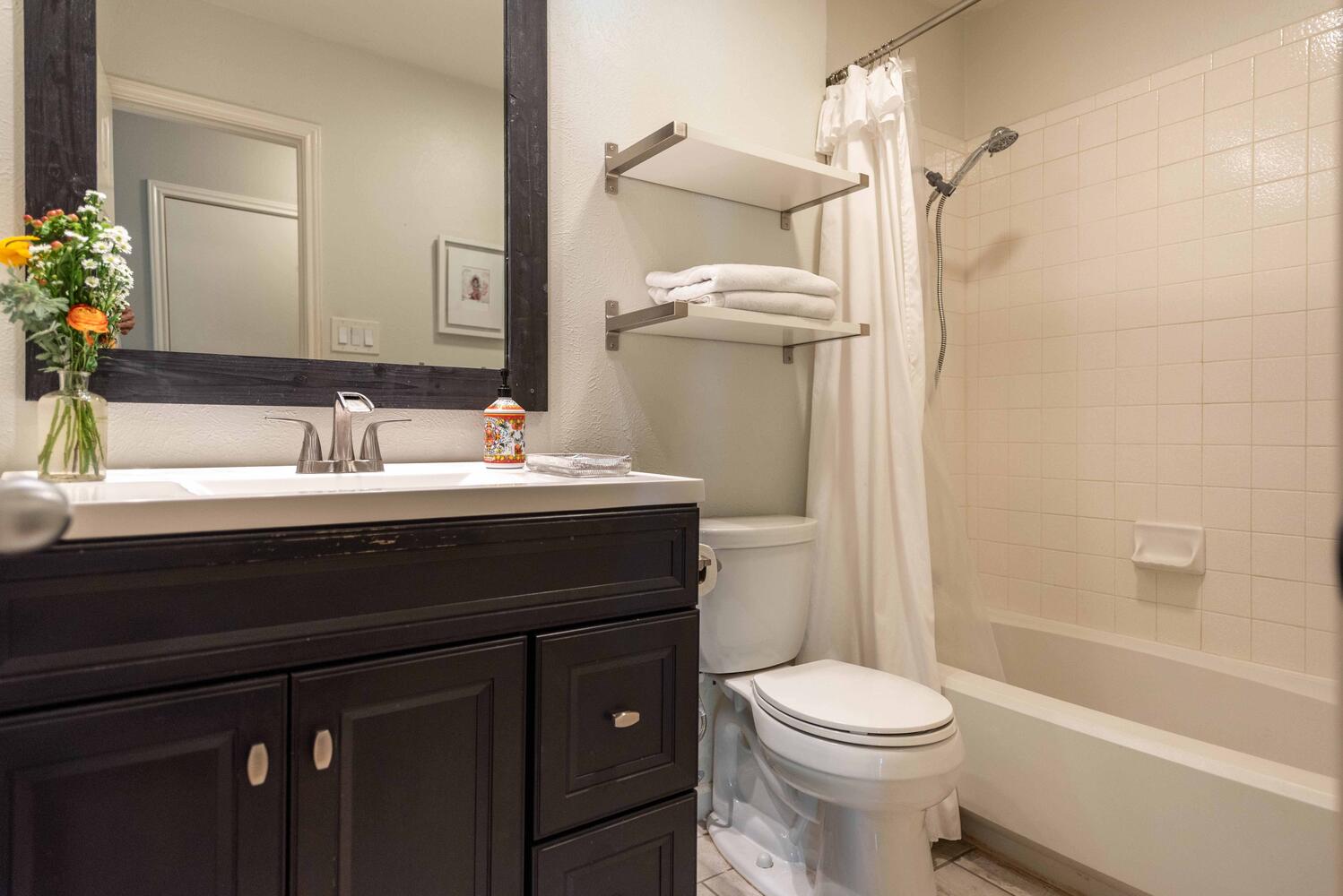 3403 Palomar Lane Austin, TX 78727 - Photo 28 of 33 Bathroom featuring vanity and shower / tub combo