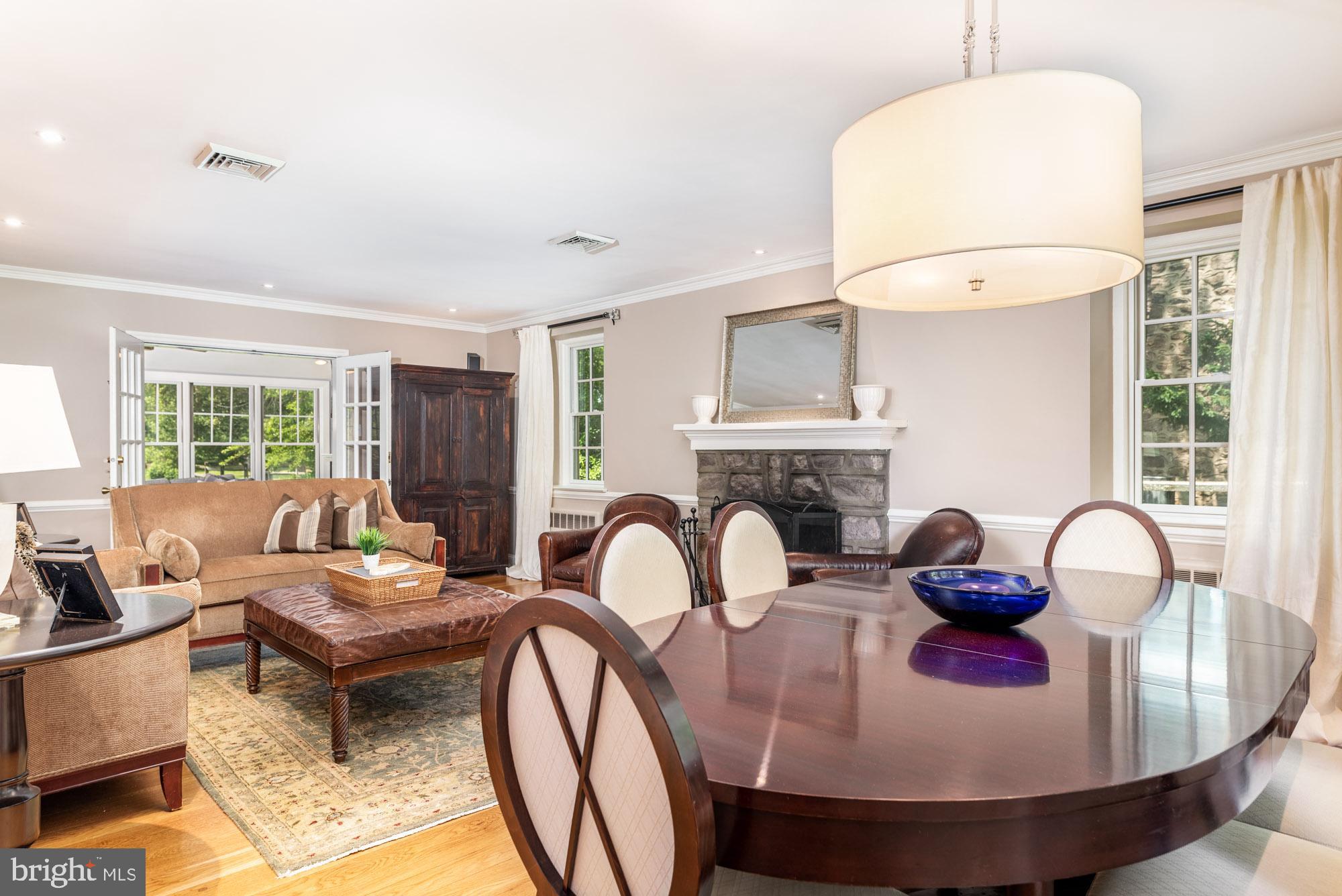 41 Meade Road Ambler, PA 19002 - Photo 3 of 42 Dining and Formal Living Room with Stone Fireplace