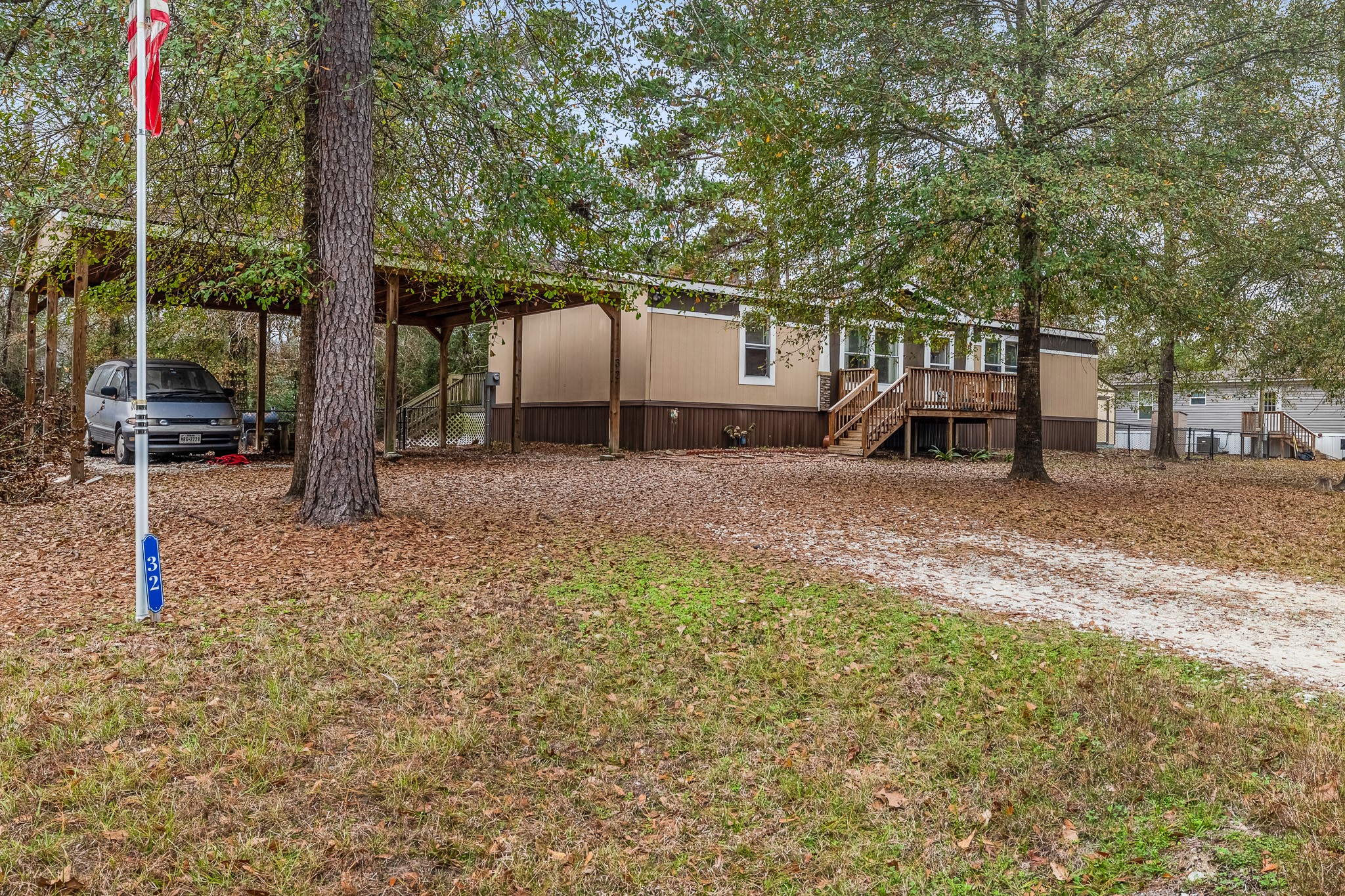 32 Oak Lake Trinity, TX 75862 - Photo 2 of 32 a house view with a backyard space