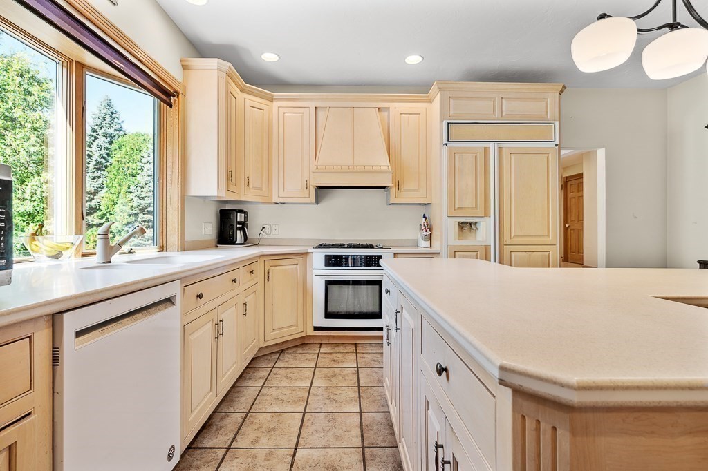 118 Upper Gore Road Webster, MA 01570 - Photo 20 of 38 a kitchen with granite countertop white cabinets and white appliances
