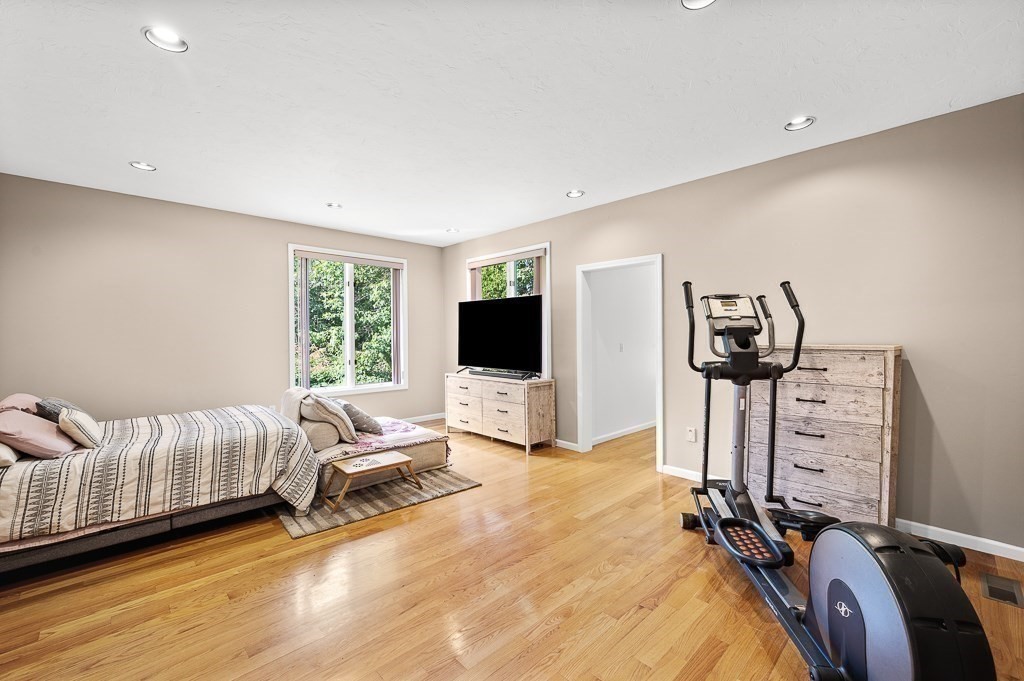 118 Upper Gore Road Webster, MA 01570 - Photo 23 of 38 a bedroom with furniture and a flat screen tv