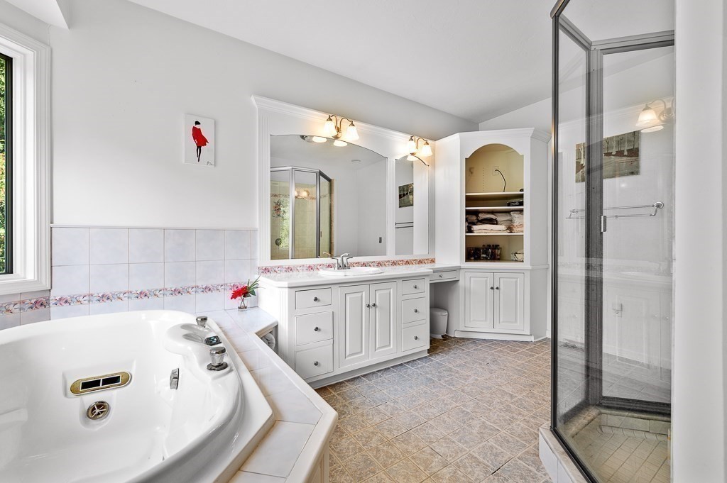 118 Upper Gore Road Webster, MA 01570 - Photo 25 of 38 a bathroom with a tub a sink and a mirror