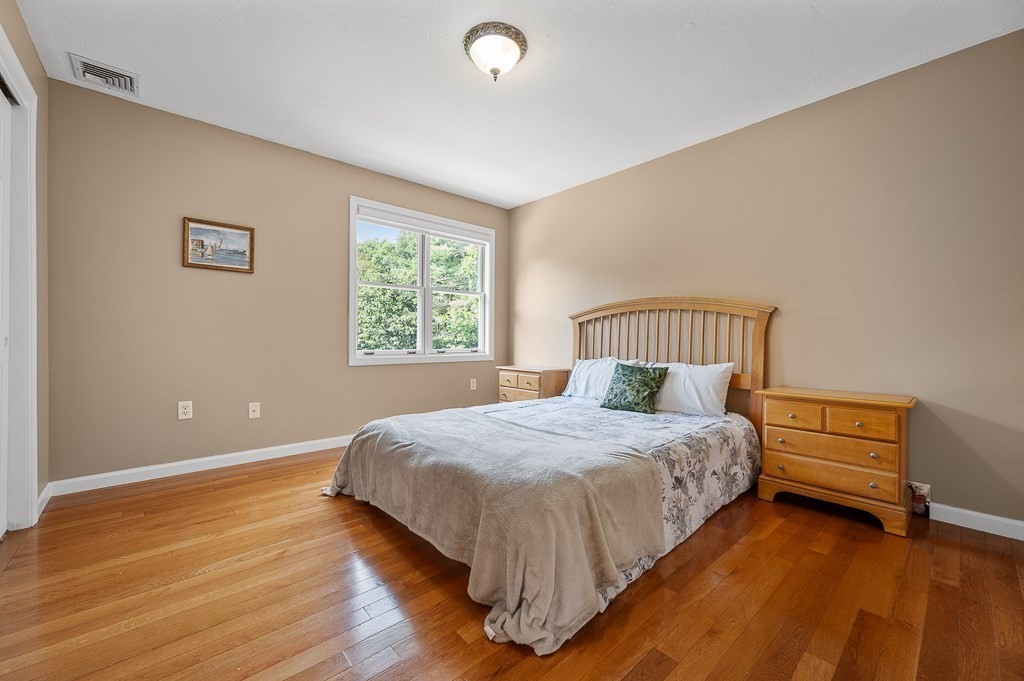 118 Upper Gore Road Webster, MA 01570 - Photo 27 of 38 a bedroom with a bed and a window
