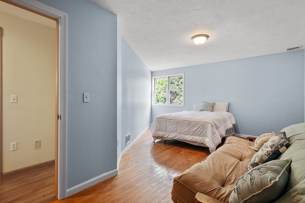 118 Upper Gore Road Webster, MA 01570 - Photo 28 of 38 a bedroom with a bed and a window