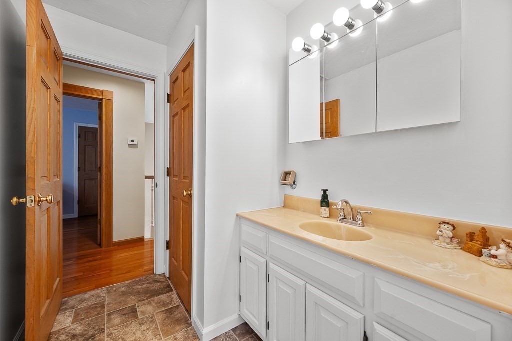118 Upper Gore Road Webster, MA 01570 - Photo 31 of 38 a bathroom with a sink and a mirror