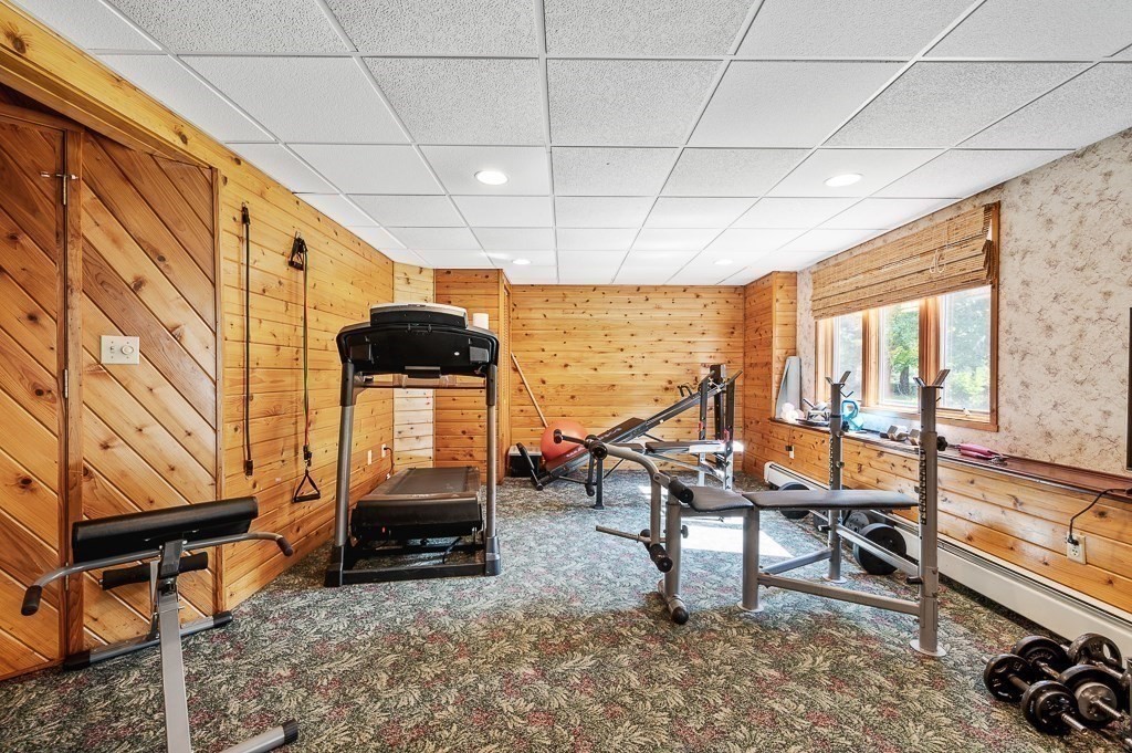 118 Upper Gore Road Webster, MA 01570 - Photo 35 of 38 a room with furniture and large windows