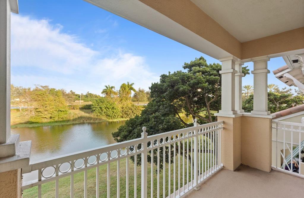 4025 Cascada Circle Hollywood, FL 33024 - Photo 13 of 19 a balcony with an ocean view