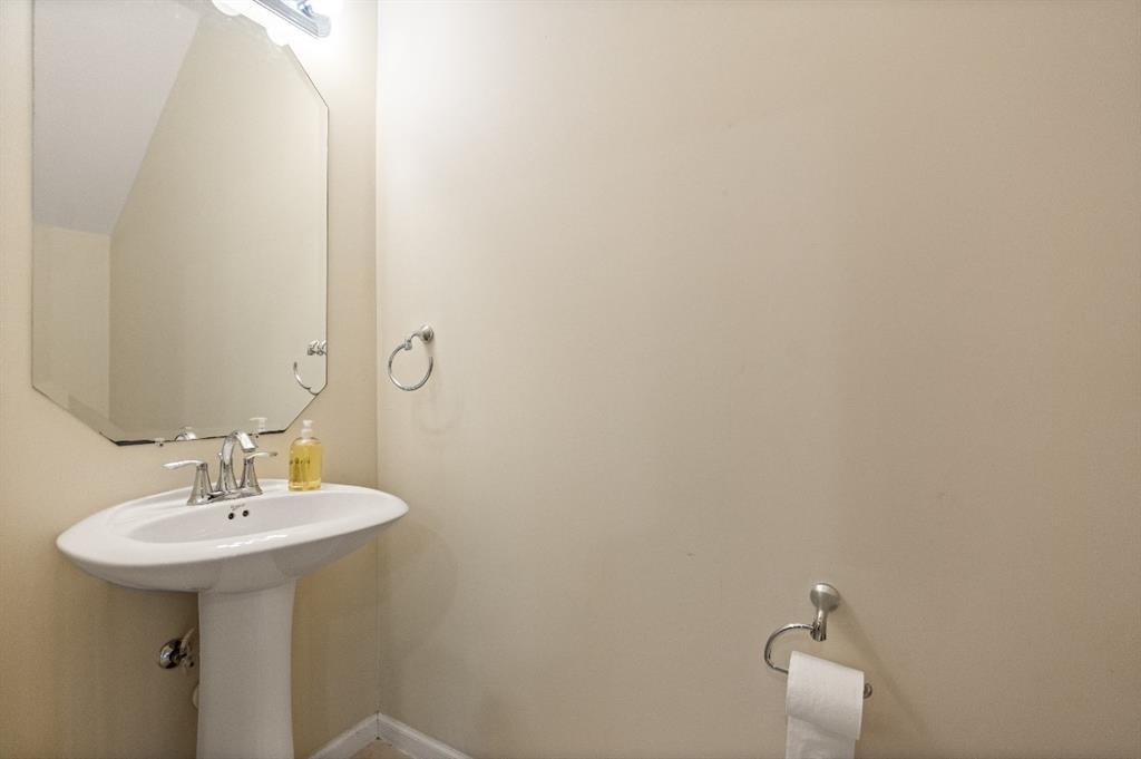 4025 Cascada Circle Hollywood, FL 33024 - Photo 19 of 19 a bathroom with a sink and mirror