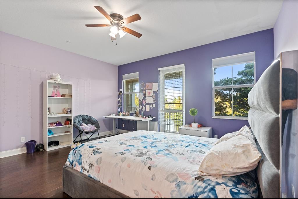4025 Cascada Circle Hollywood, FL 33024 - Photo 8 of 19 a bed room with a bed and a chair