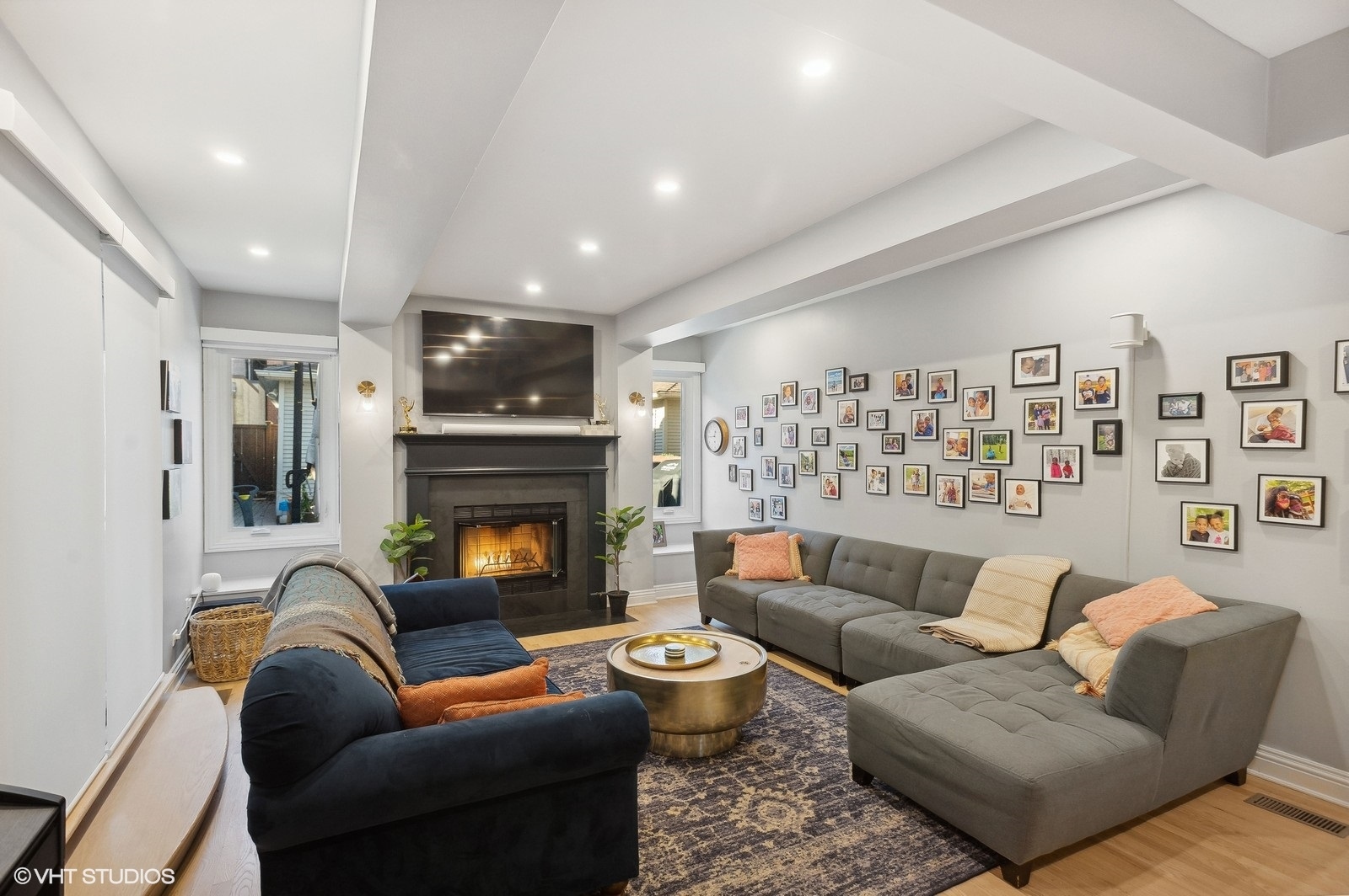 3838 North Wayne Avenue Chicago, IL 60613 - Photo 15 of 40 a living room with furniture and a fireplace