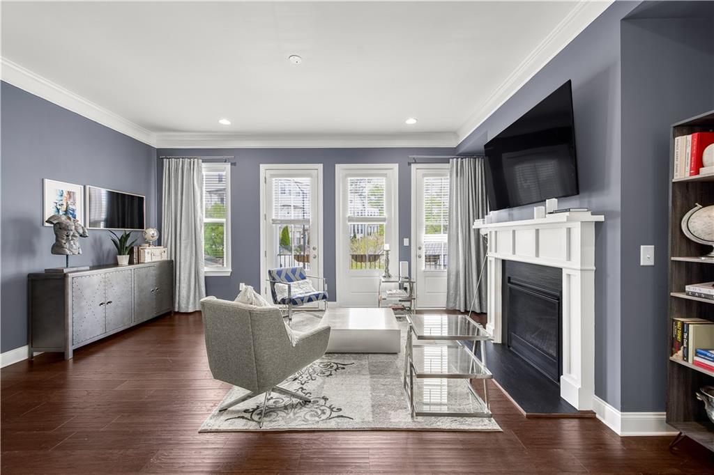2013 Rockledge Road Northeast Atlanta, GA 30324 - Photo 17 of 50 a living room with furniture fireplace and flat screen tv