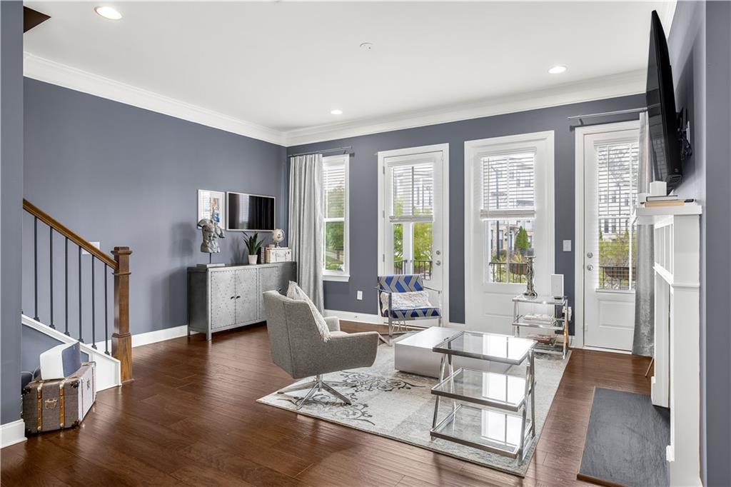 2013 Rockledge Road Northeast Atlanta, GA 30324 - Photo 18 of 50 a living room with fireplace furniture and a flat screen tv