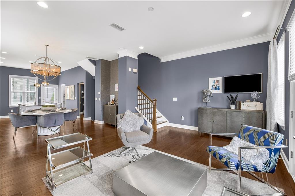 2013 Rockledge Road Northeast Atlanta, GA 30324 - Photo 22 of 50 a lobby with furniture and a flat screen tv