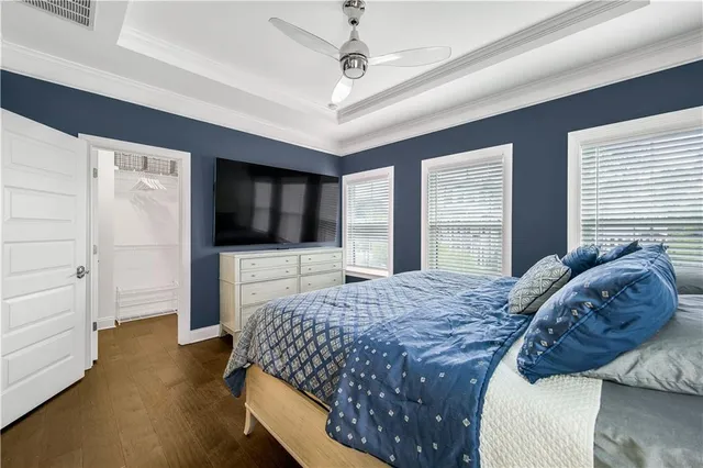 a bathroom with double sink and a mirror