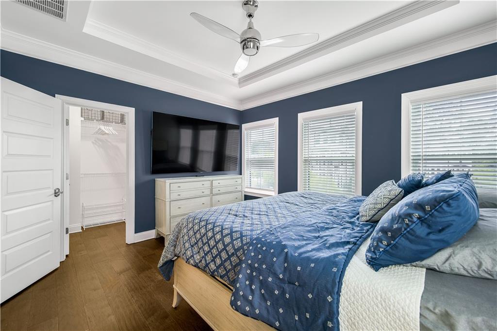 2013 Rockledge Road Northeast Atlanta, GA 30324 - Photo 28 of 50 a bedroom with a bed and a flat screen tv