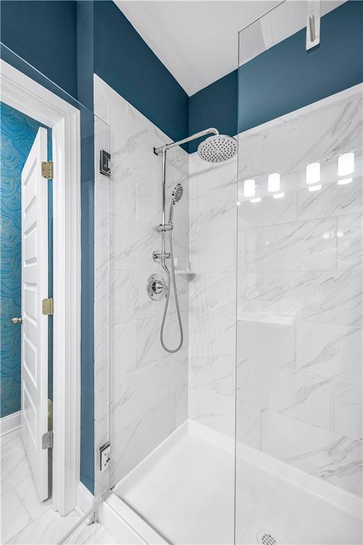 2013 Rockledge Road Northeast Atlanta, GA 30324 - Photo 30 of 50 a bathroom with a glass shower door