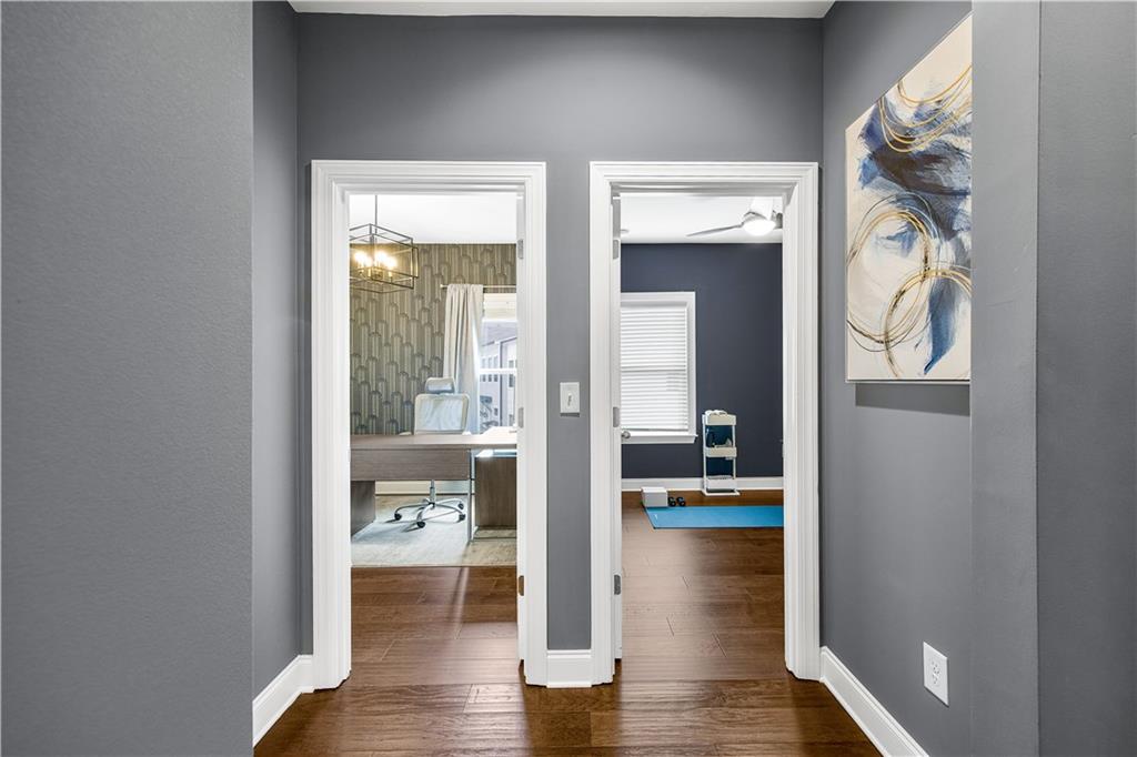 2013 Rockledge Road Northeast Atlanta, GA 30324 - Photo 31 of 50 a view of a hallway with wooden floor and a living room
