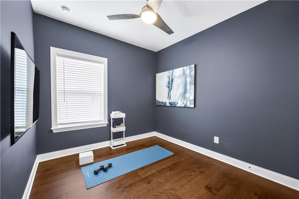 2013 Rockledge Road Northeast Atlanta, GA 30324 - Photo 36 of 50 a room with window and wooden floor