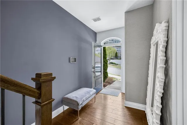 a view of entryway with wooden floor