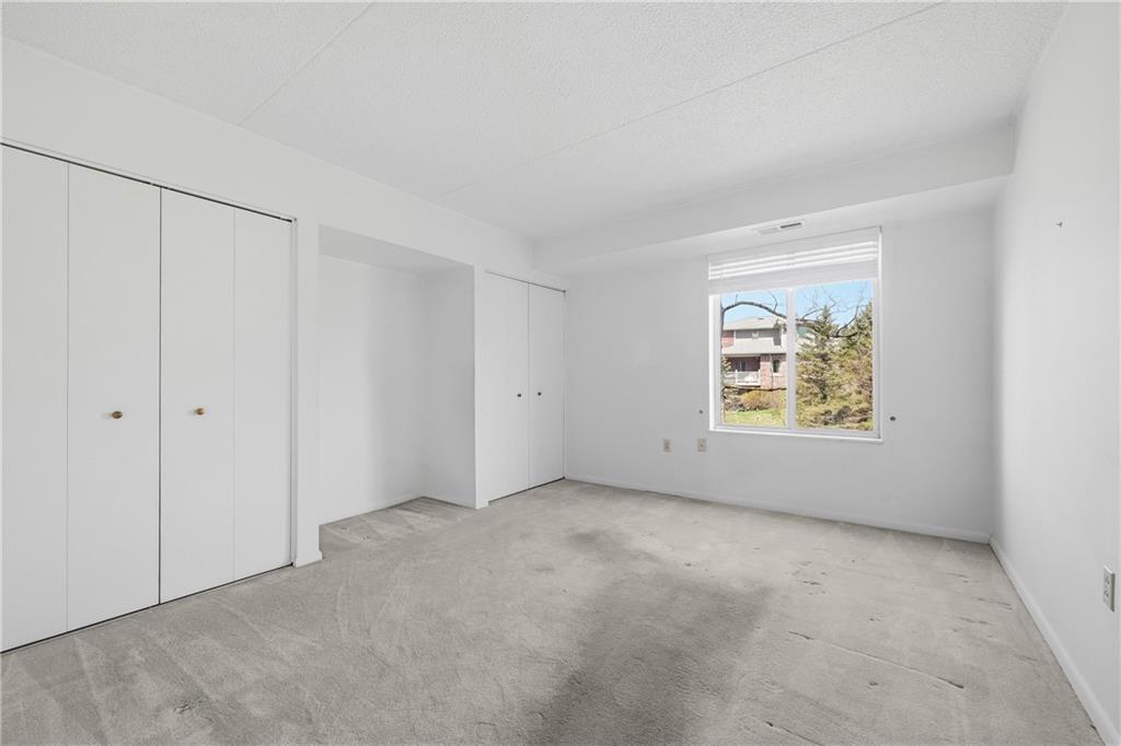 2160 Greentree Road, Unit 705W Pittsburgh, PA 15220 - Photo 16 of 32 a view of an empty room with a window