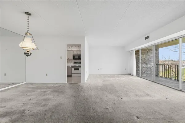 an empty room with windows