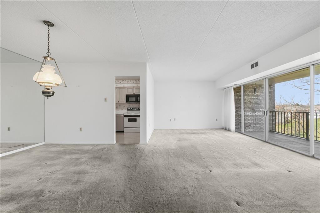 2160 Greentree Road, Unit 705W Pittsburgh, PA 15220 - Photo 7 of 32 a view of an empty room with a window