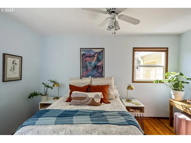 a bedroom with furniture and window