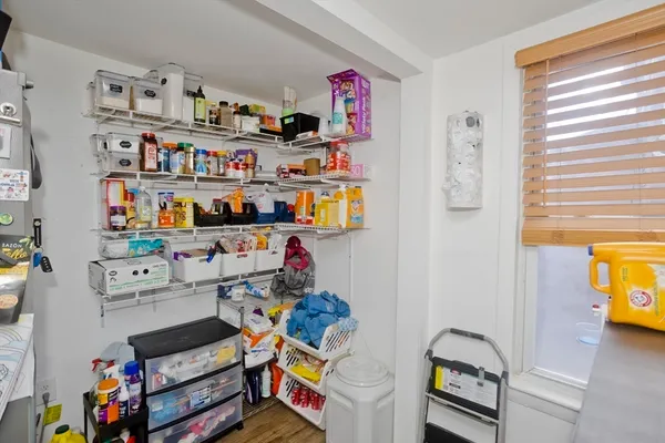 a room with toys and a book shelf