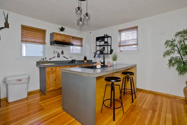 a workspace with furniture and window