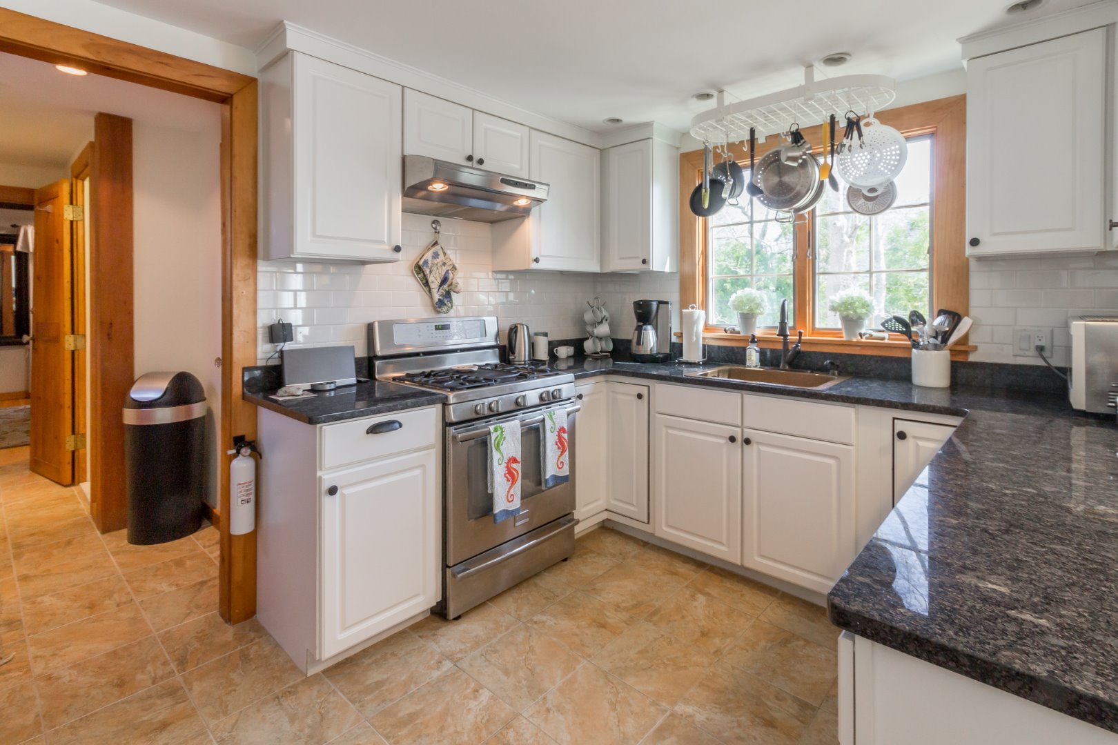 37 Edgartown Meadows Road Edgartown, MA 02539 - Photo 18 of 38 a kitchen with a sink stove and refrigerator