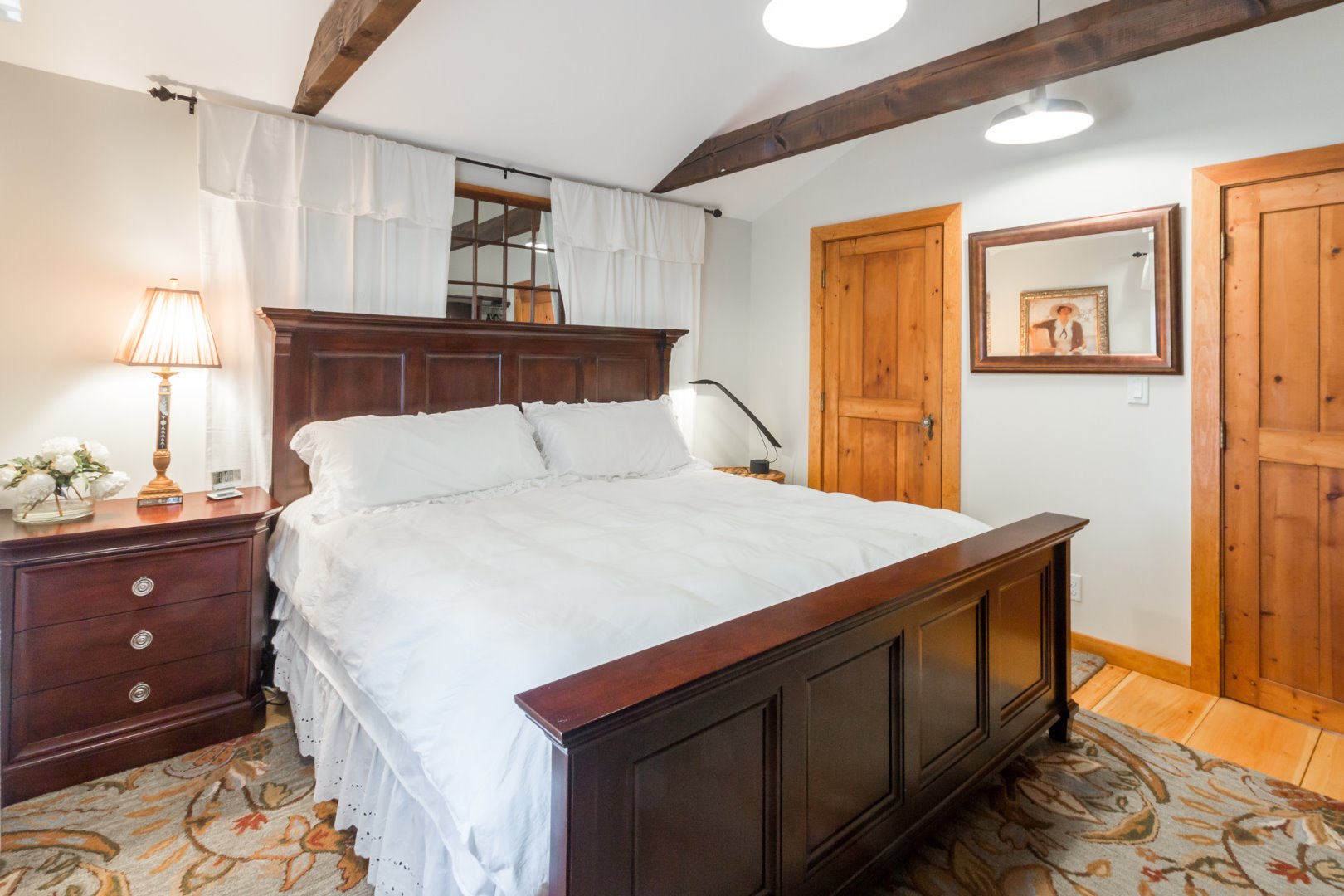 37 Edgartown Meadows Road Edgartown, MA 02539 - Photo 20 of 38 a bedroom with a bed and wooden floor