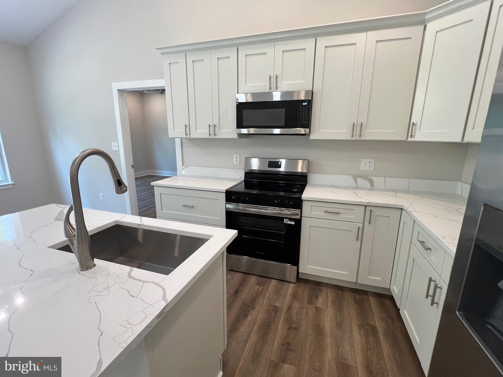 171 Wildwood Road Colonial Beach, VA 22443 - Photo 23 of 41 Kitchen w/ Quartz Countertops