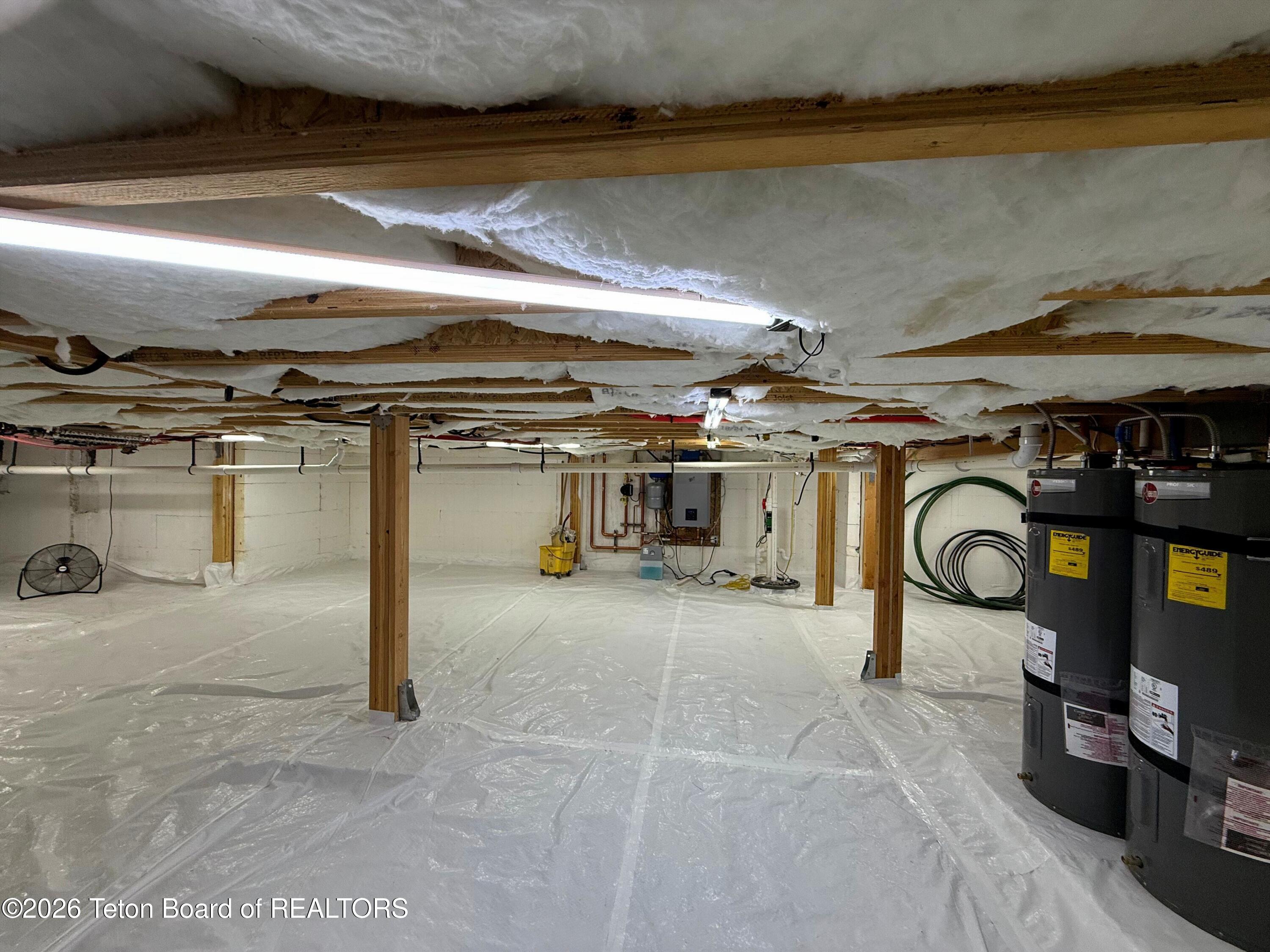 9802 Hiddenwaters Lane Victor, ID 83455 - Photo 36 of 52 Walk-in Crawl Space Storage.2