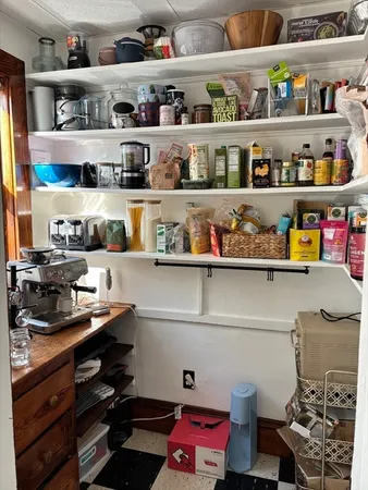 a room with lots of different kinds of food