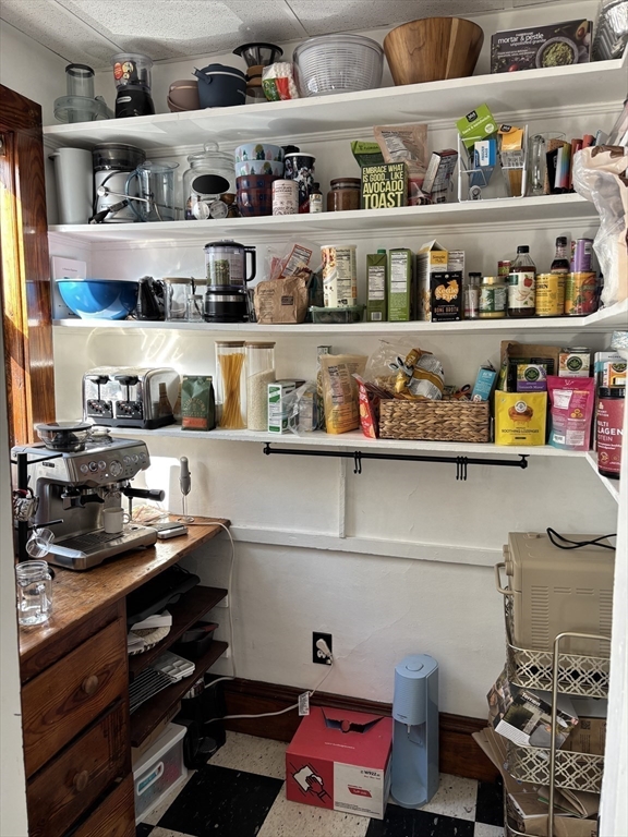 97 Nightingale Avenue, Unit 2 Quincy, MA 02169 - Photo 11 of 17 a room with lots of different kinds of food