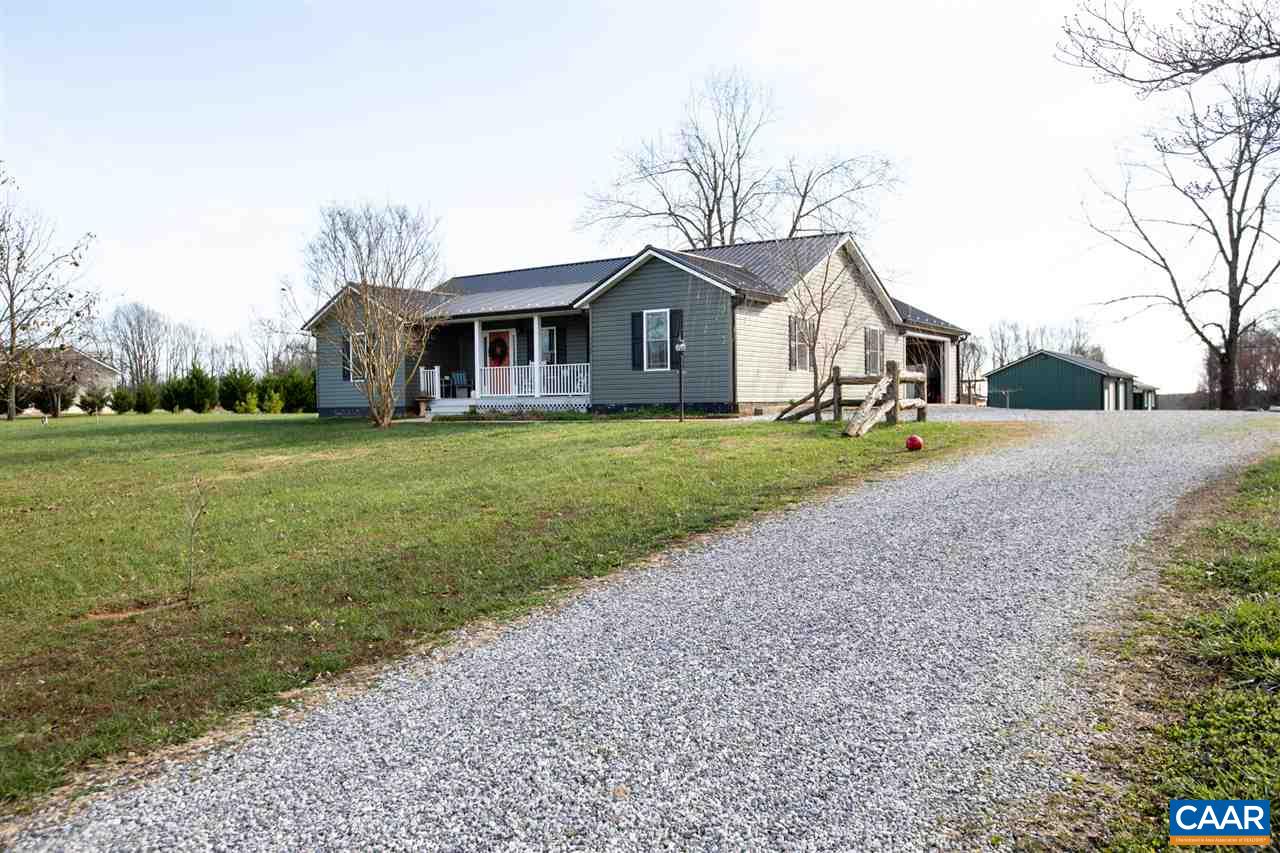 962 School Road Farmville, VA 23901 - Photo 1 of 41 a front view of a house with a yard and trees