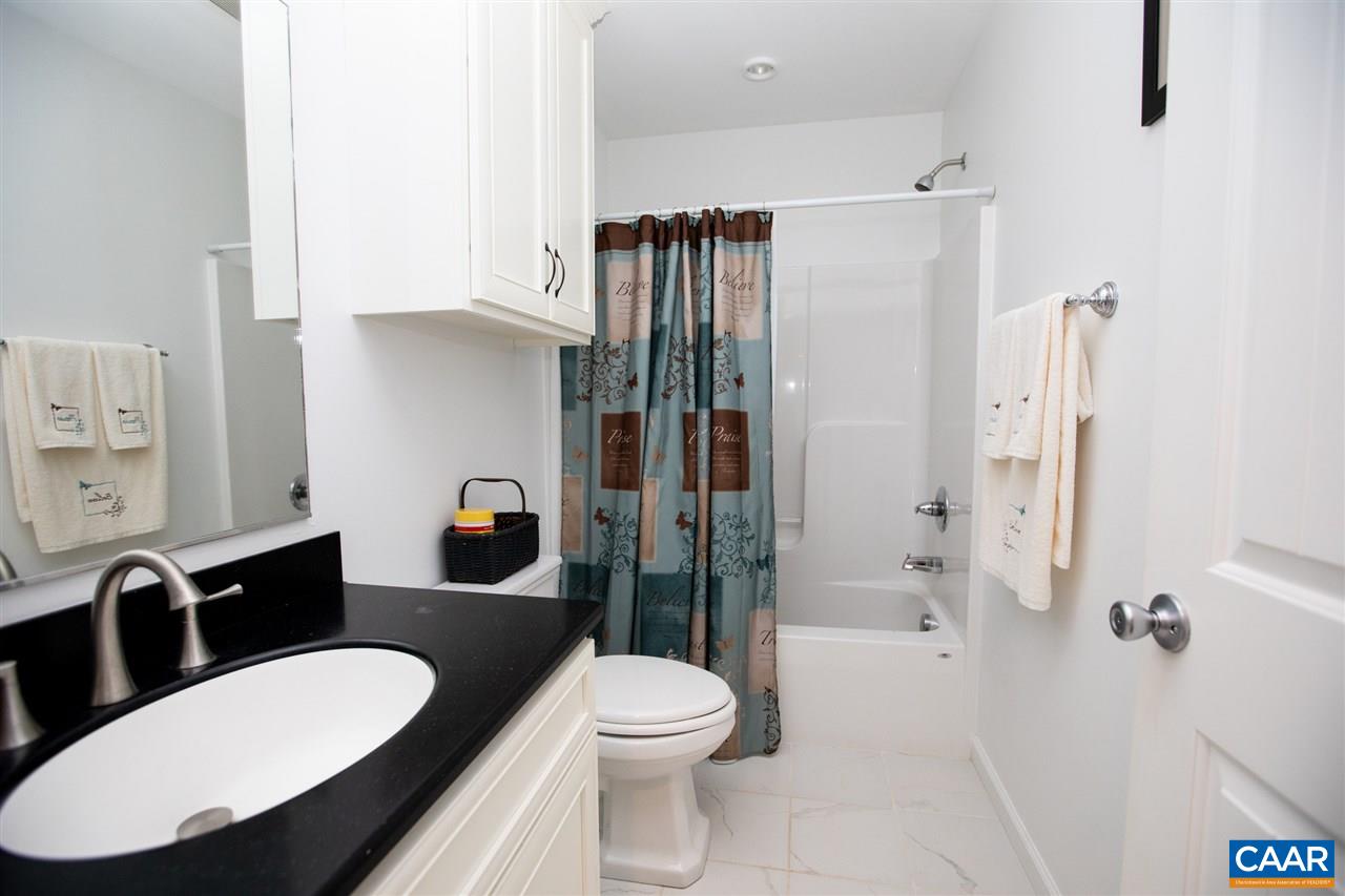 962 School Road Farmville, VA 23901 - Photo 24 of 41 a bathroom with a toilet a sink and shower