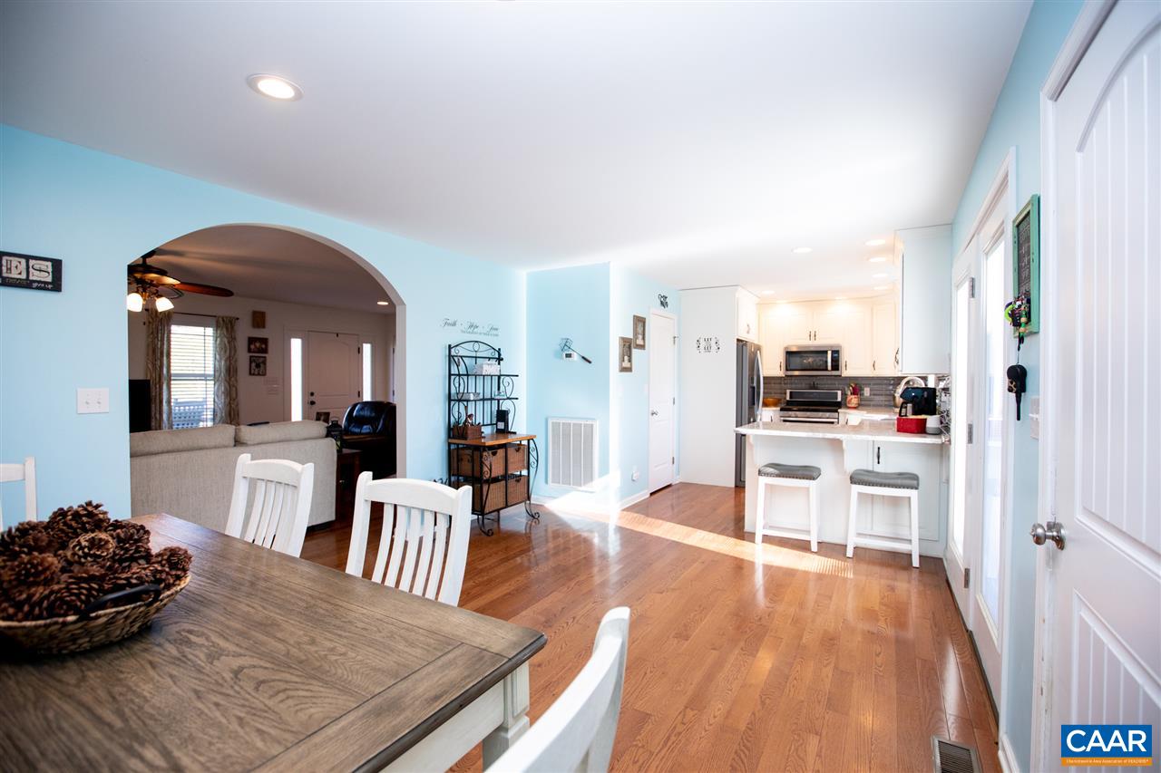 962 School Road Farmville, VA 23901 - Photo 5 of 41 a living room with furniture and kitchen view with wooden floor