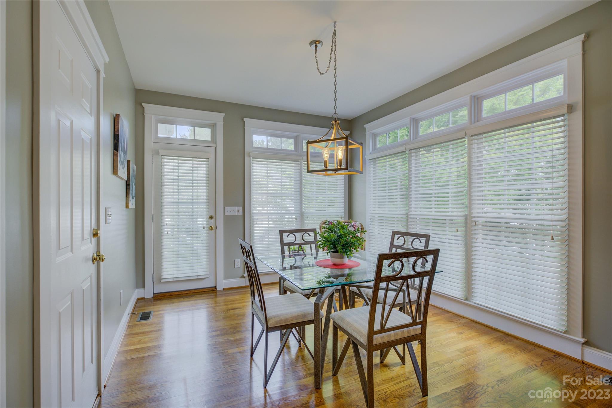 357 Elis Way Fort Mill, SC 29708 - Photo 17 of 48 a view of a dining room with furniture window and wooden floor