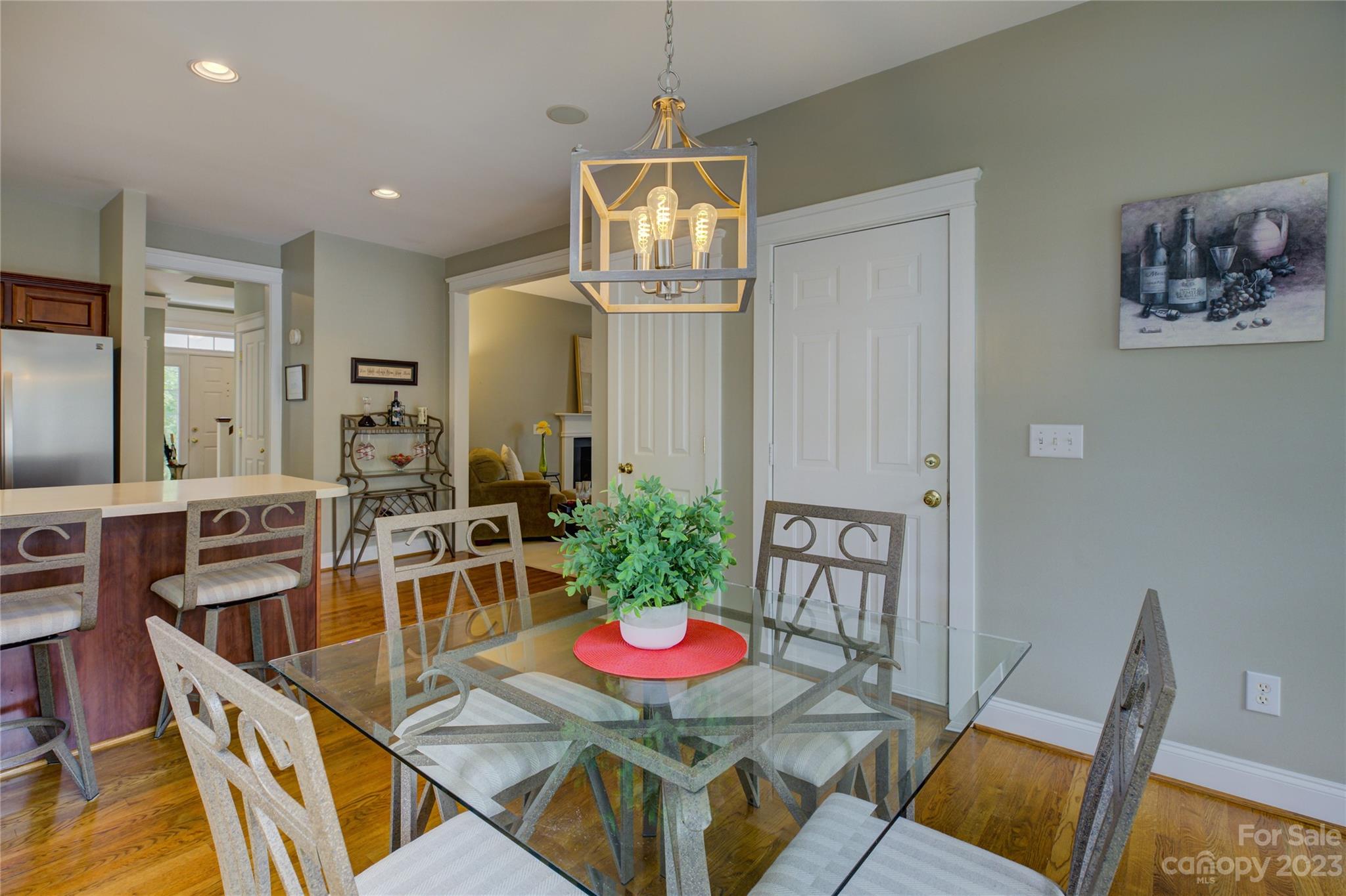 357 Elis Way Fort Mill, SC 29708 - Photo 18 of 48 a dining room with furniture a rug and wooden floor