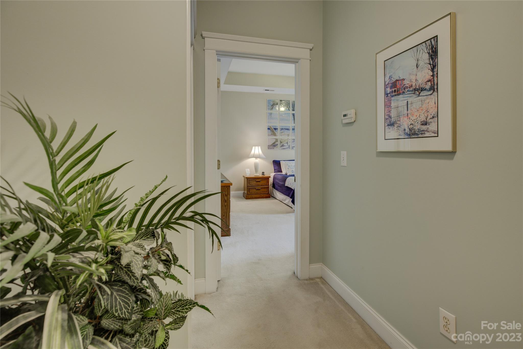 357 Elis Way Fort Mill, SC 29708 - Photo 29 of 48 a view of a hallway with paintings on the wall