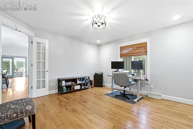 a view of a workspace with furniture